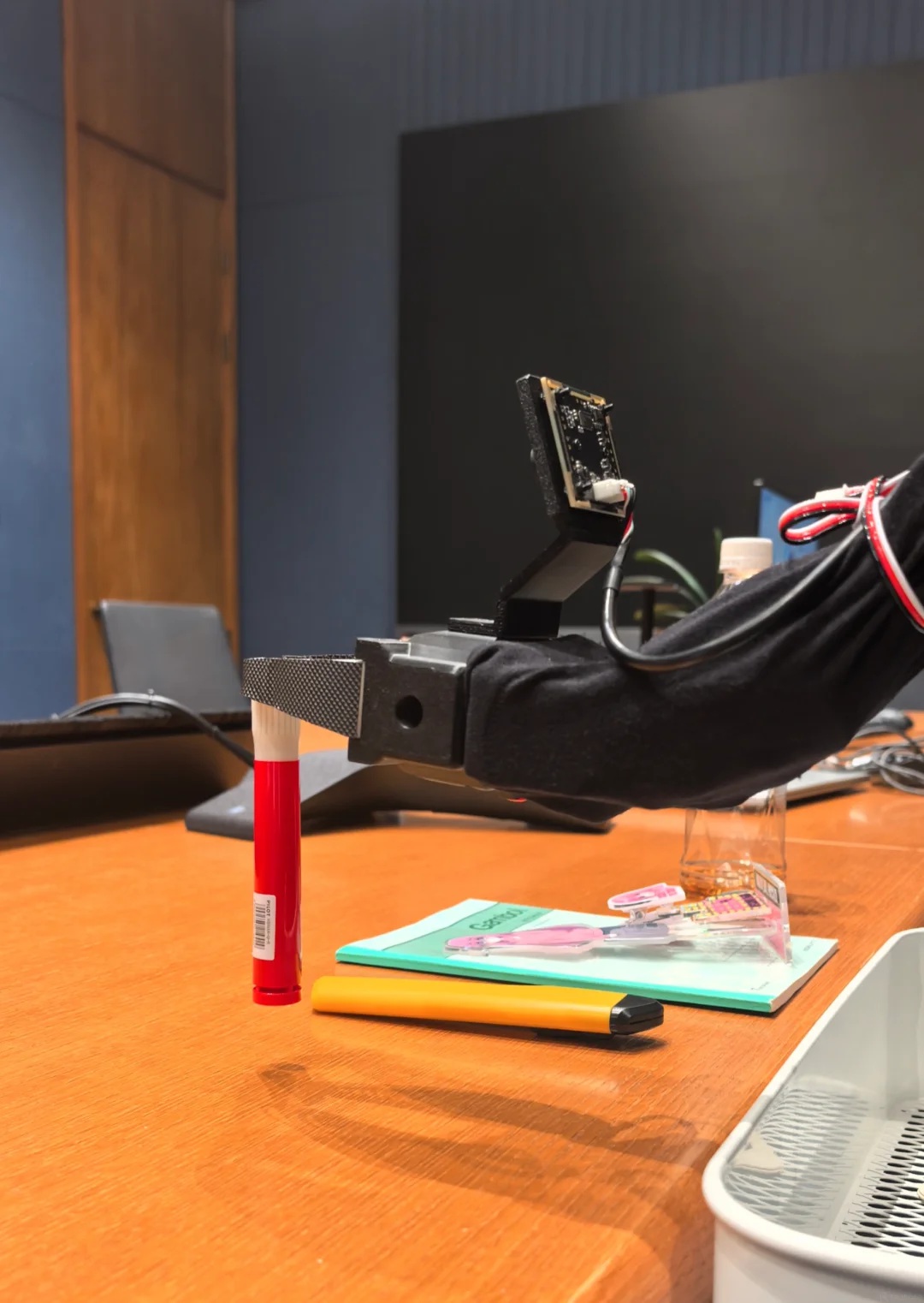 https://github.com/zjwzcx/Awesome-Astra-Embodied-AI/blob/HEAD/Robot arm grasping a marker